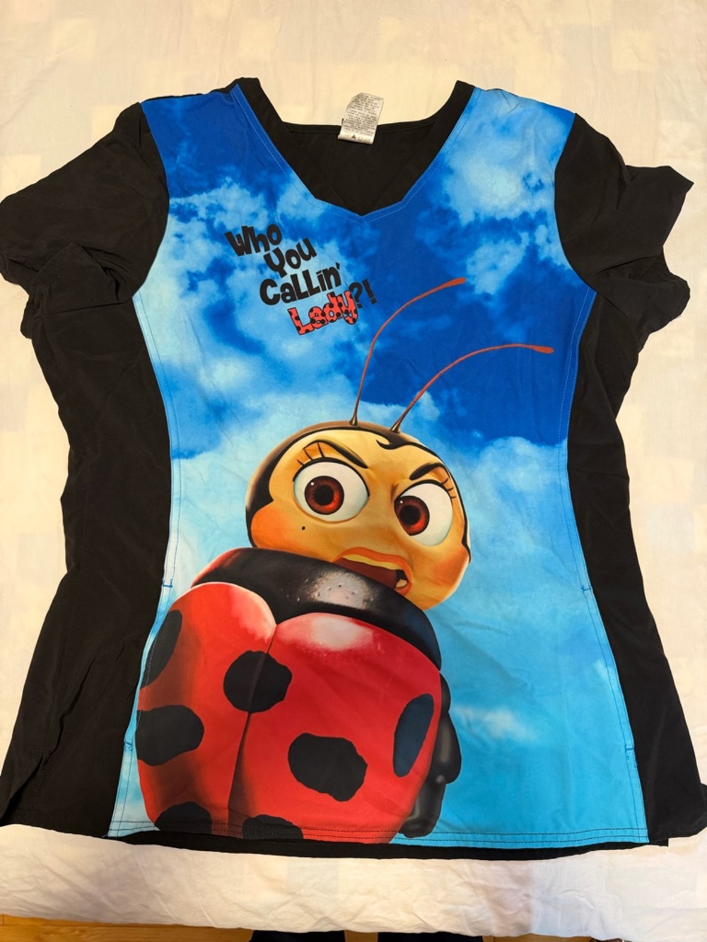 Blue & Black Ladybug Scrub top